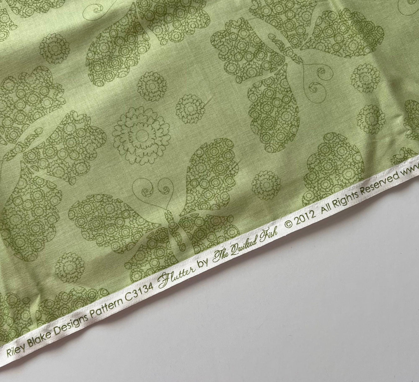 DESTASH 1 Yard Cut of Flutter - Lacy Butterflies on Green Tonal Fabric, Riley Blake C3134, The Quilted Fish