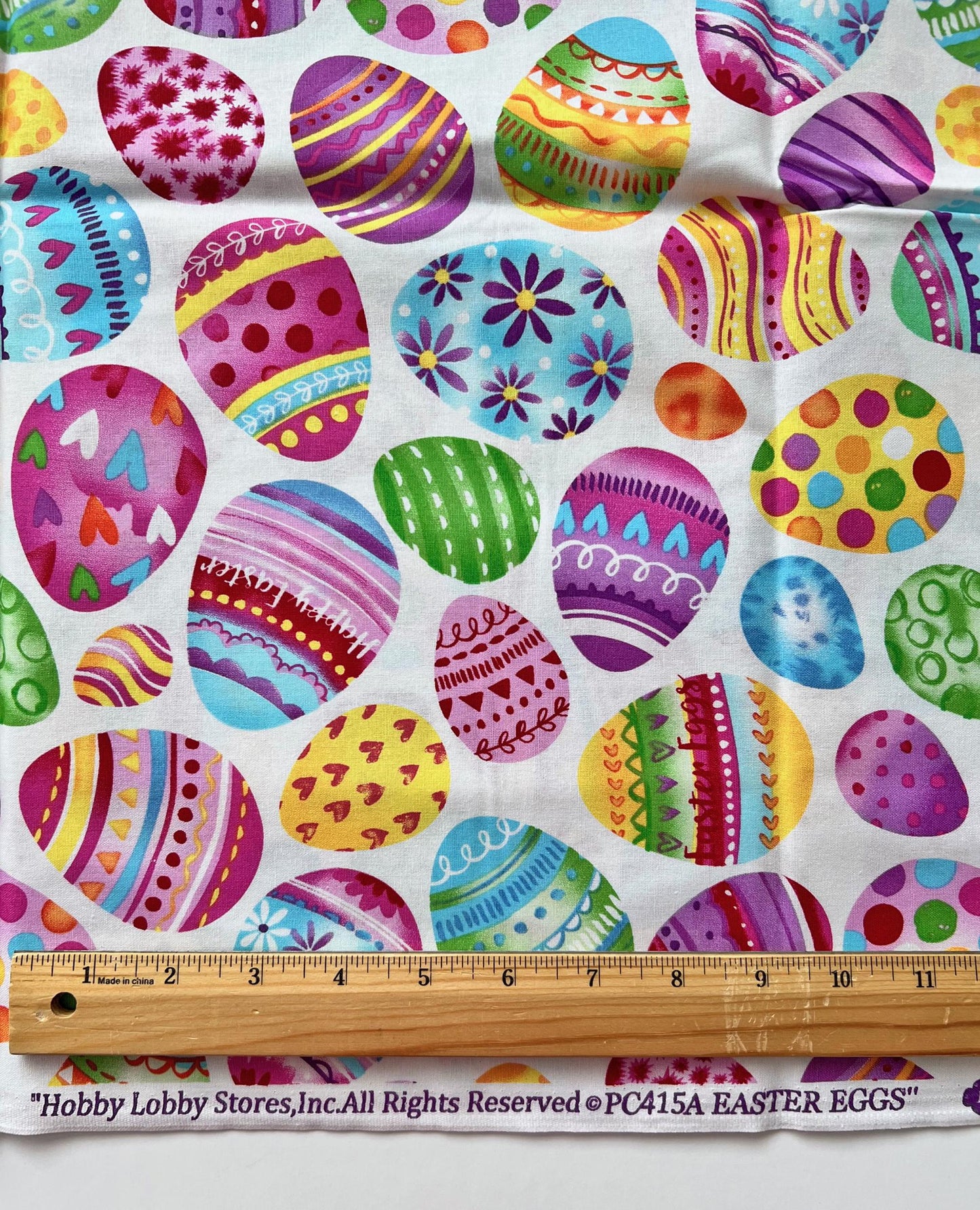 DESTASH 1 Yard Cut of Easter Eggs on White Fabric, Hobby Lobby PC415A, Purple Pink Yellow Blue Green Easter Eggs Fabric