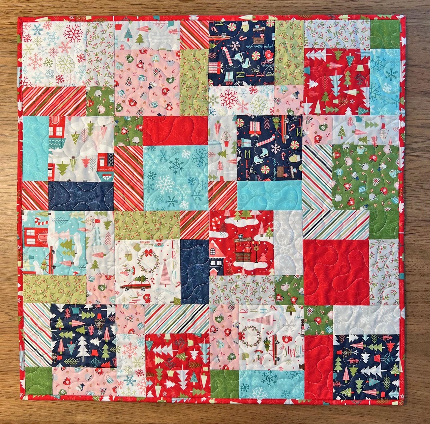 Cup of Cheer Christmas Quilted Table Topper, 26.5" Square Table Topper, Disappearing 9 Patch Red Blue Green Xmas Table Quilt