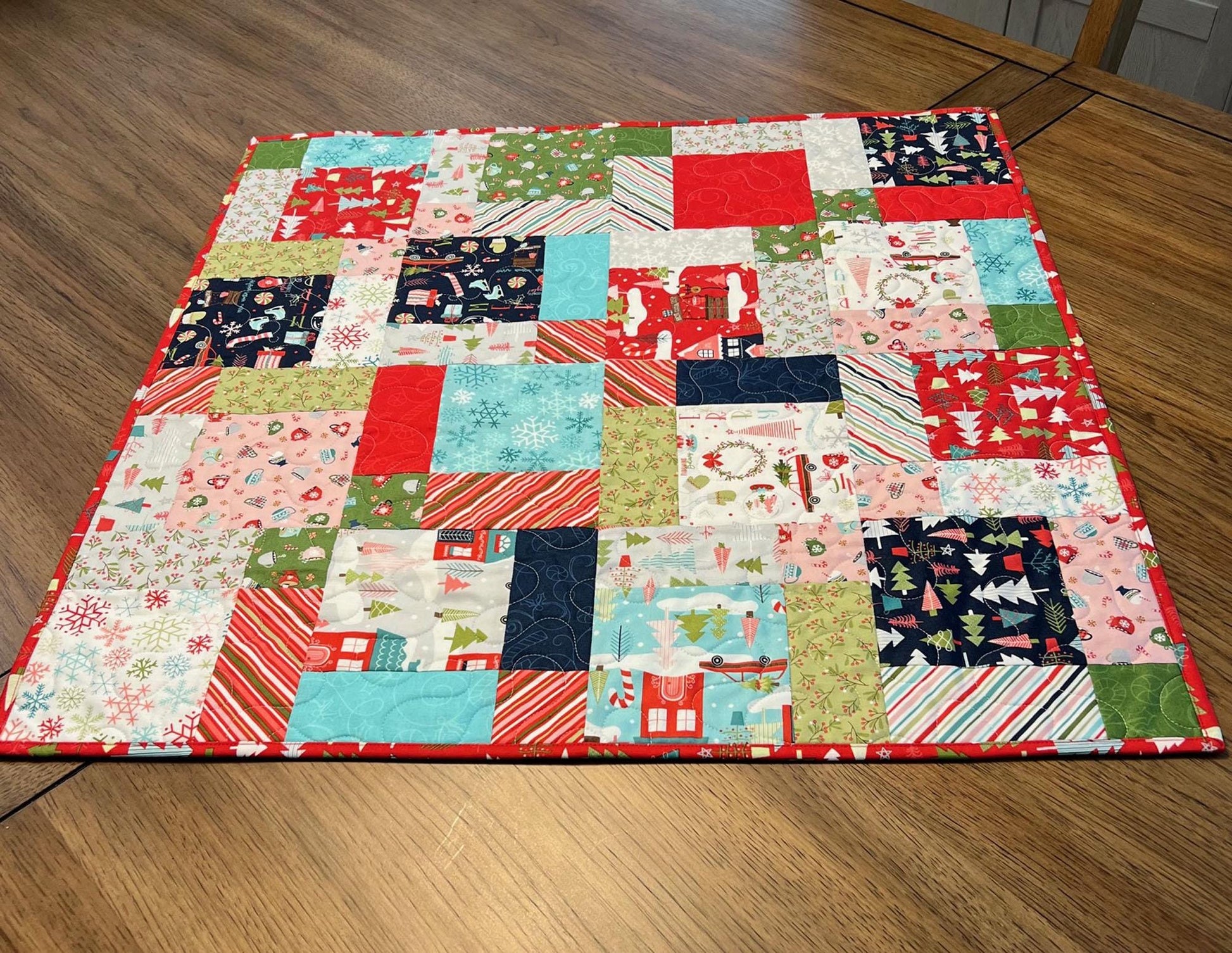 Cup of Cheer Christmas Quilted Table Topper, 26.5" Square Table Topper, Disappearing 9 Patch Red Blue Green Xmas Table Quilt