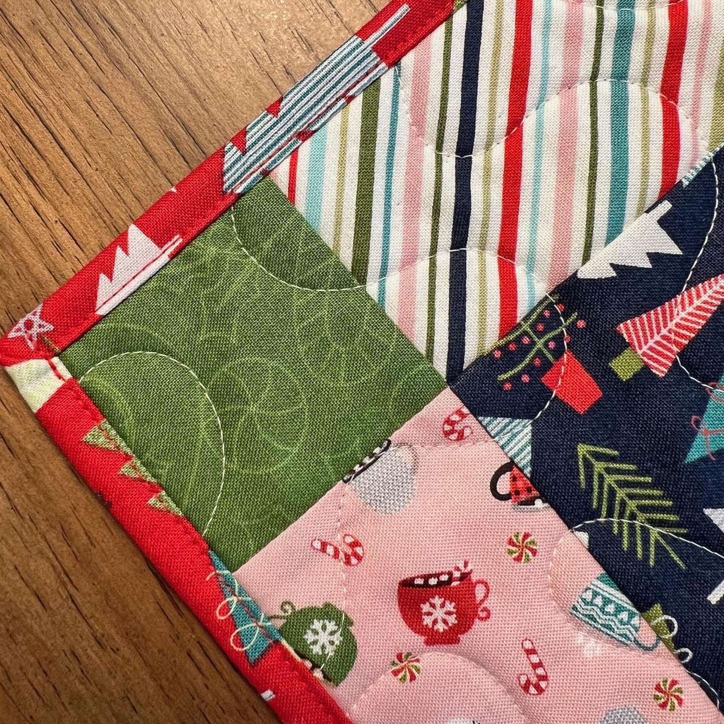 Cup of Cheer Christmas Quilted Table Topper, 26.5" Square Table Topper, Disappearing 9 Patch Red Blue Green Xmas Table Quilt