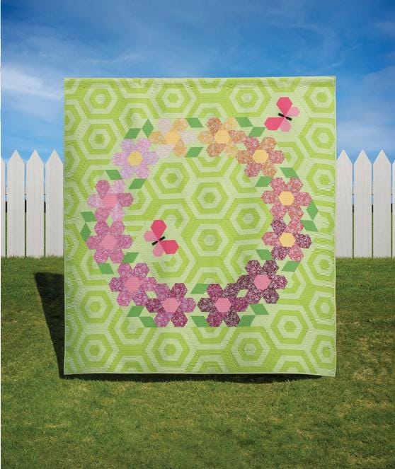 The Flutterby Frolic Quilt Pattern, The Quilted Life TQL10031, Yardage Friendly Spring Floral Wreath Lap Quilt Pattern, 60 Diamond Ruler